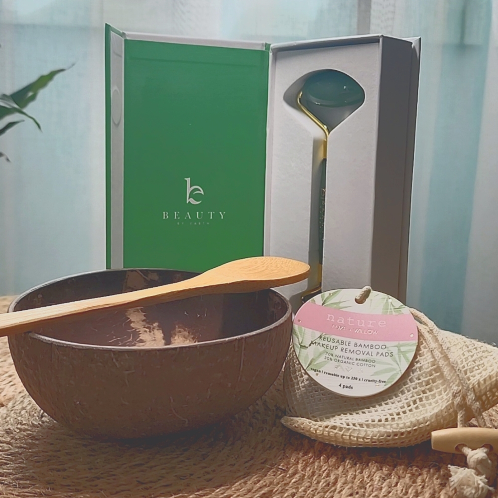 Skincare tools, jade roller, coconut shell bowl